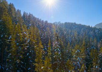 Mountain landscape in sunny winter frosty  blue clear sky.