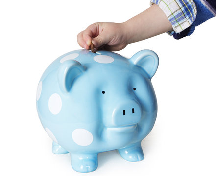 Saving money in a piggy bank