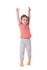 girl standing on tiptoes and stretches his arms up