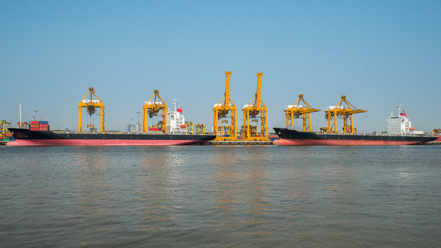 Industrial shipping port in Bangkok with blue sky