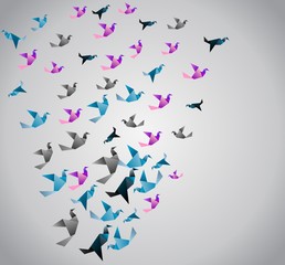 Fototapeta na wymiar Origami background. Paper is transformed to birds.