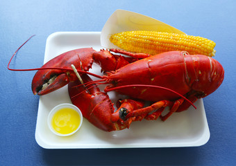 Boiled Maine lobster with corn