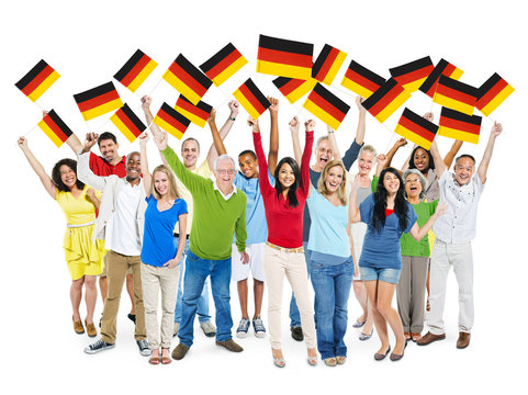 Multi-Ethnic Group of Diverse Happy People Waving German Flag