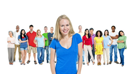 Fototapeta premium Blonde Young Woman Standing In Front Of A Crowd