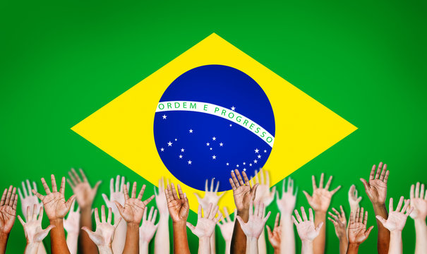 Human Hands with Flag of Brazil for Background