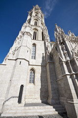 Matthias Church tower Budapest low angle view with blue sky