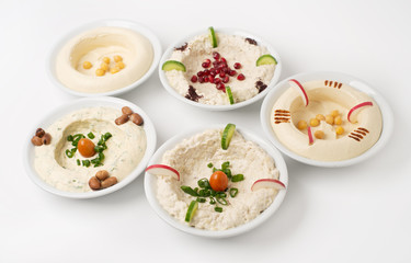 Arabic traditional Hummus Plates with different toppings