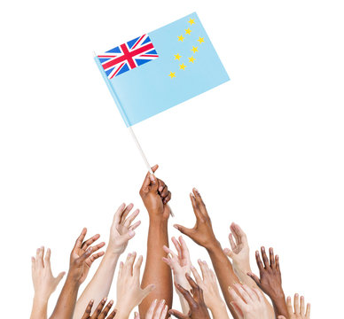 Diverse People Holding The Flag of Tuvalu