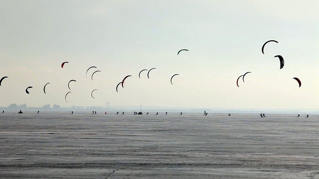 snowkiting on a frozen pond