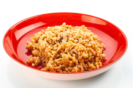 freshly cooked rice on red dish