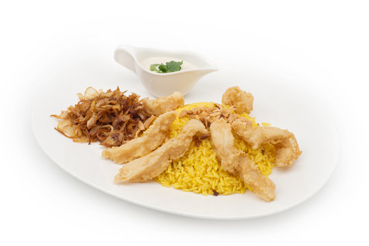 Chicken and Rice plate served with tartar and fried onion