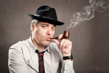middle aged man with a pipe