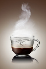 Сoffee and water in cup isolated on white