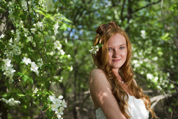Naklejka premium Beautiful woman in garden.