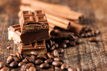 Chocolate candy bar cofee beans cinnamon horizontal