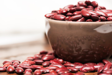 Bowl with raw red beans close up reflections