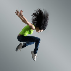 beautiful caucasian woman dancer jumping