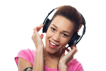 Fototapeta premium Young female listening to music
