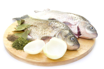 Raw fish crucian with spices