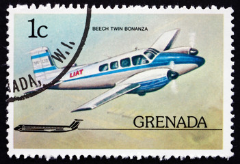 Postage stamp Grenada 1976 Beech Twin Bonanza, Airplane