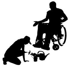 Vector silhouettes of people in a wheelchair.