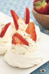 Strawberry and whipped cream meringues