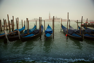 Fototapeta na wymiar Venice, Italy. Gondolas on Grand Canal at sunrise.