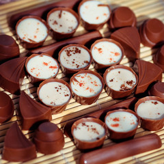 chocolate candies in different shapes and colors.