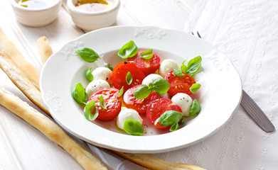Caprese salad; mini mozzarella, cherry tomatoes and basil