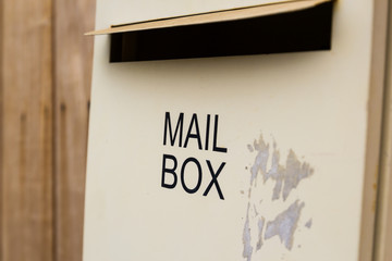 mailbox on wood wall