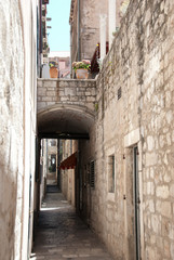 A narrow pathway between medieval buildings, Dubrovnik, Croatia