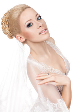 Blonde bride with a veil.