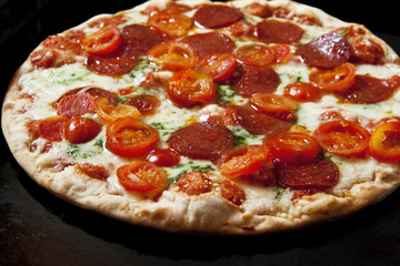 Pizza with Salami and Cherry Tomatoes