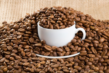 Cup with coffee beans