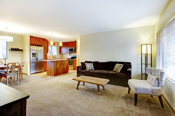 Living room design. View of the kitchen and dining area