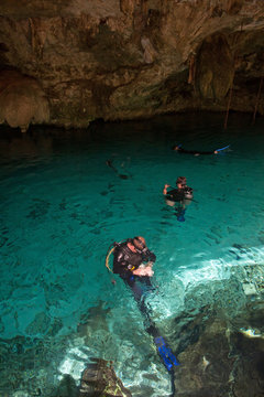 Diving in a cenote, Mexico