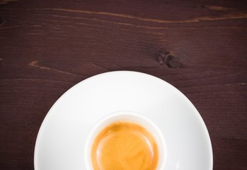 top of view of half cup of italian espresso coffee