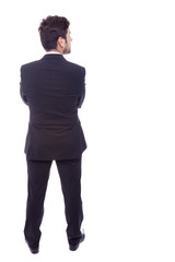 Business man from back looking at something, isolated on white