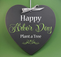 Happy Arbor Day, Plant a Tree, greeting on blackboard