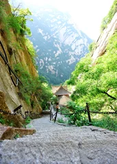 Poster steep stone stairs at mountain huashan in china © lzf
