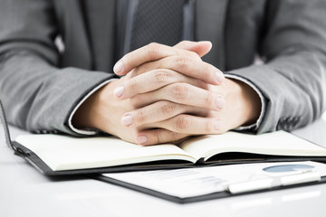 business report and man hand with pen