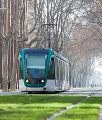 Fototapeta premium tram on street of city