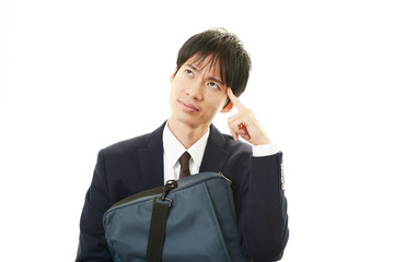 頭痛を訴えるビジネスマン