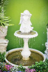 Naklejka premium Fountain decoration in the garden
