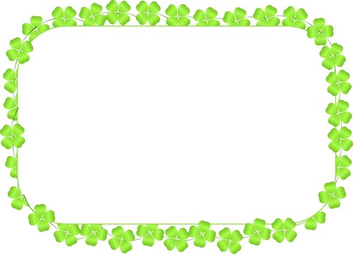 Border made of four-leaf clovers on a white background