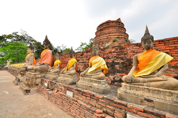 Fototapeta na wymiar Row of Stone Buddha Statue in Ayutthaya Province, Thailand