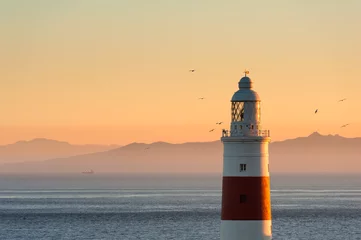 Foto op Aluminium Gibraltar Lighthouse at Sunset © allard1
