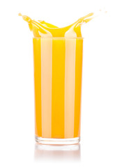 Fresh orange juice in glass with splash