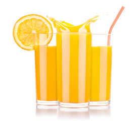 Fresh orange juice in glass with splash