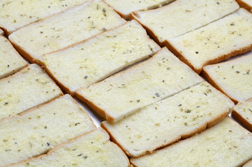 butter bread and herb on plate